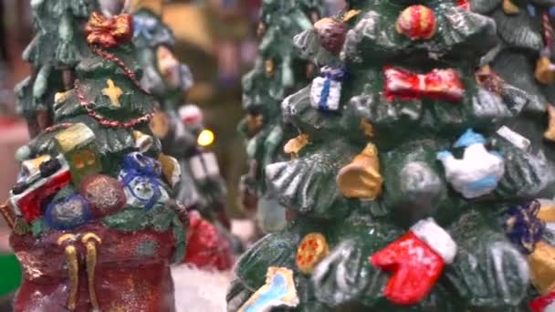 Mid Shot Snow Dusted Christmas Fir Tree Candles Whirler Décorations — Video