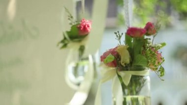 Two Bunches of Flowers Hung on ceremony