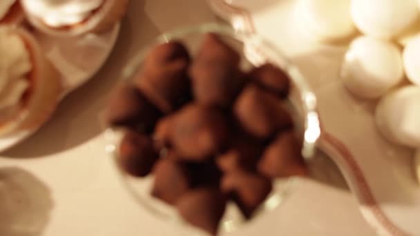 Truffle candies on a plate — Stock Video