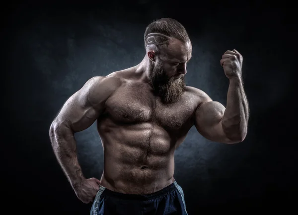 Strong man with perfect abs, shoulders, biceps, triceps and ches — Stock Photo, Image