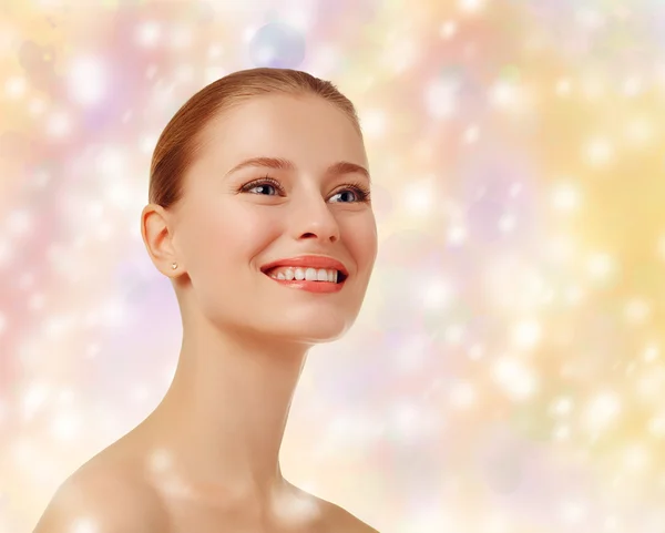 Beautiful happy woman on a colorful background. Colored lights. — Stock Photo, Image