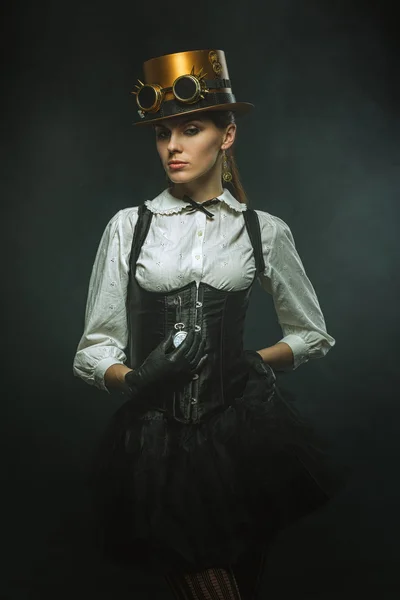 Elegant steampunk girl with the clock — Stock Photo, Image