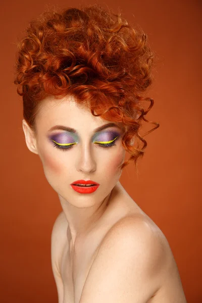 Red-haired. Beautiful girl with bright makeup — Stock Photo, Image