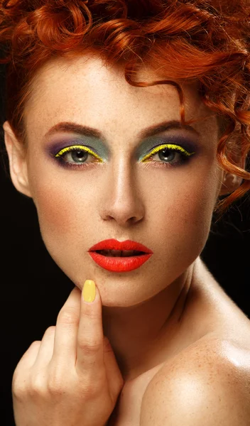 Red-haired. Beautiful girl with bright makeup — Stock Photo, Image