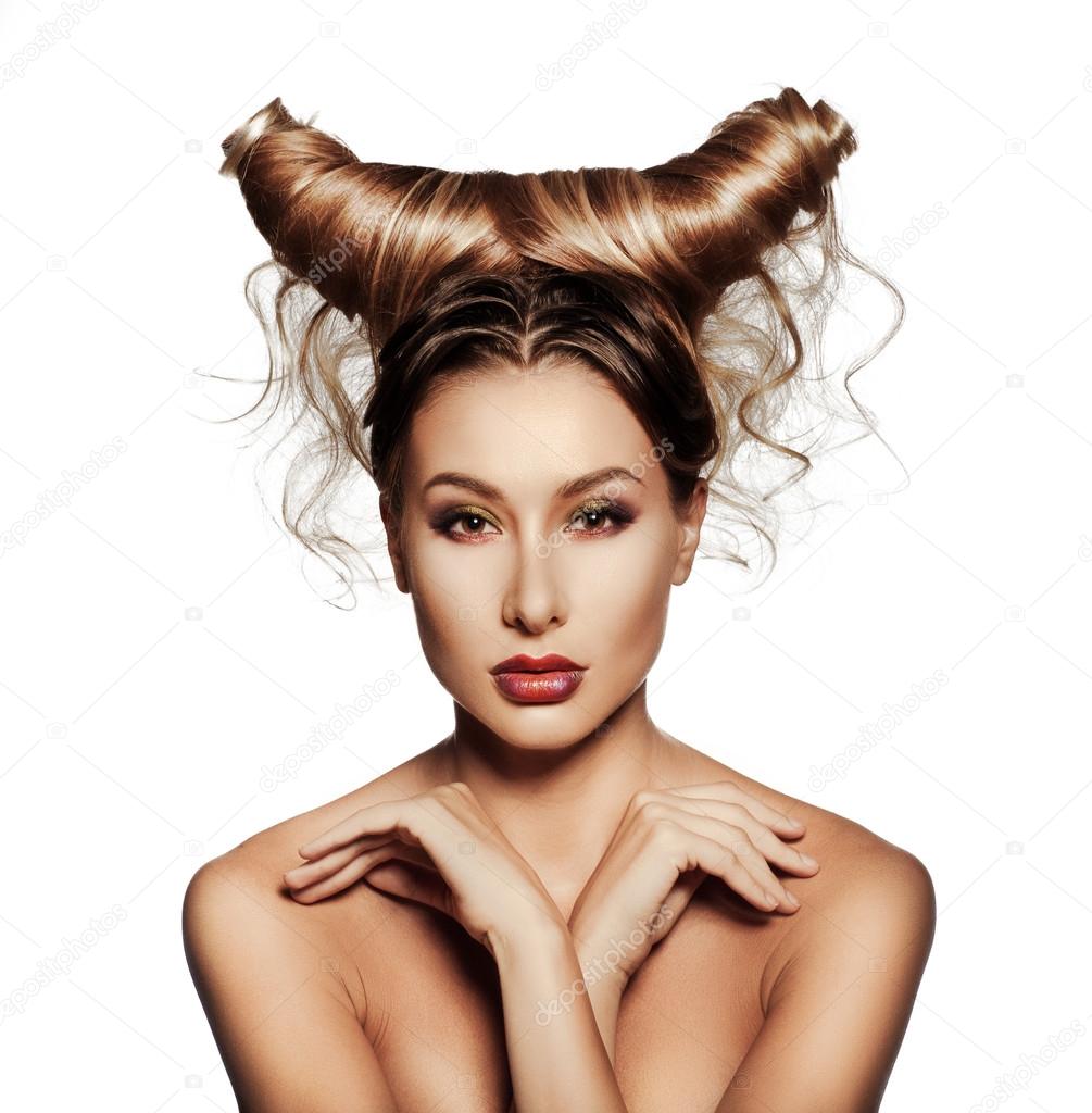 Fashion art portrait of sexy beautiful woman with horns.