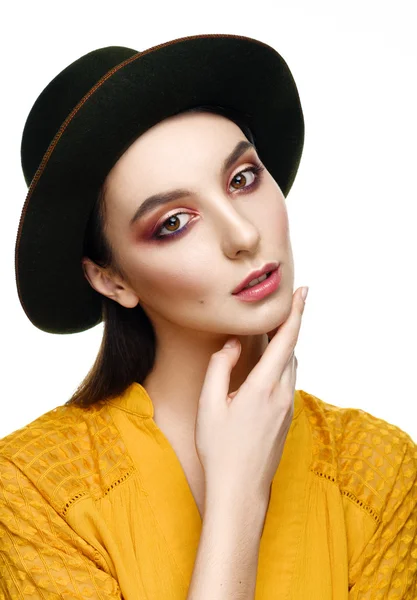 Portrait of a beautiful girl in the hat on a white background — Φωτογραφία Αρχείου