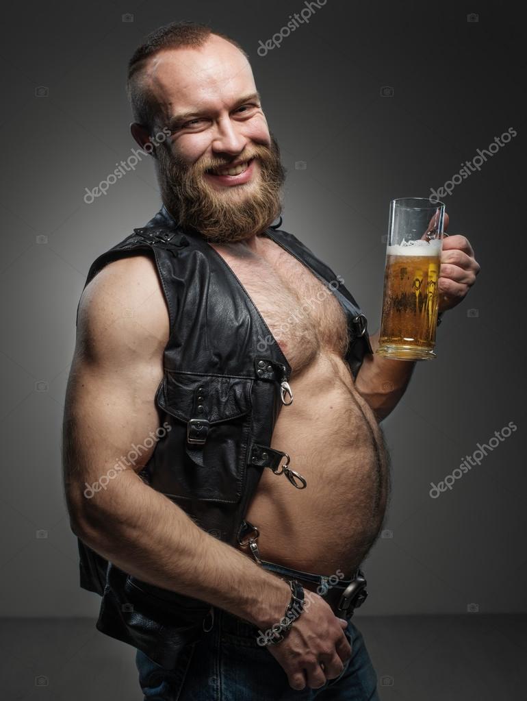 Sourire motard avec le ventre de bière — Photographie fotoatelie