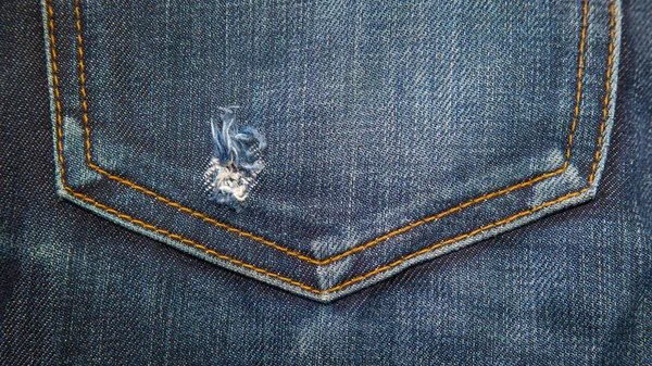 Blauwe denim jeans textuur. Jeans achtergrond — Stockfoto