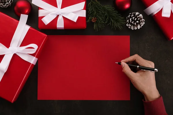 Hands Writing Red Greeting Card Mockup Christmas Decoration Grunge Background — Stock Photo, Image