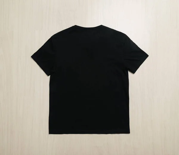 Μαύρο Shirts Μακιγιαρισμένο Πρότυπο Ξύλινο Πάτωμα — Φωτογραφία Αρχείου