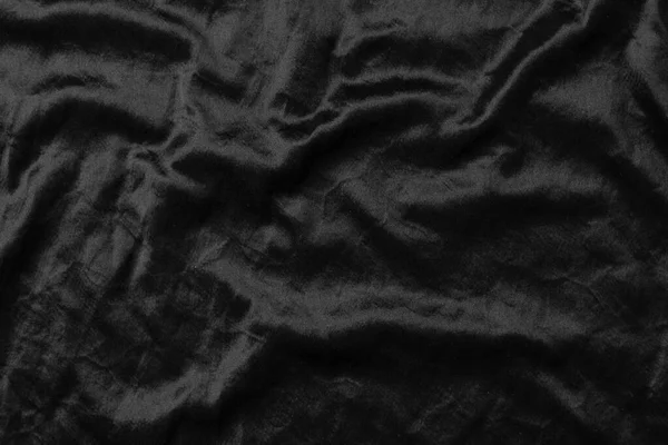 要旨黒い布の質感の背景または液体波または波状の折り目 — ストック写真