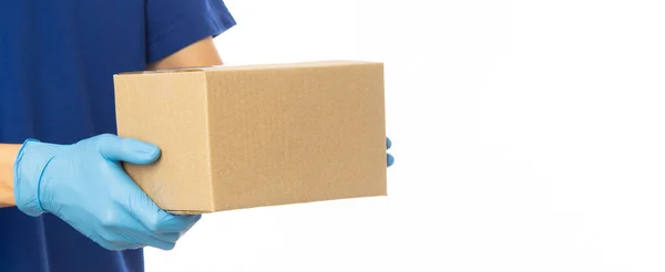 Closeup Delivery Man Hand Medical Gloves Holding Cardboard Box Isolated — Stock Photo, Image