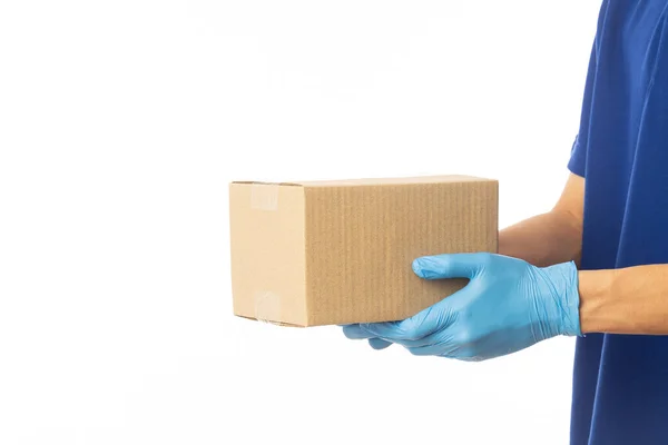 Closeup Delivery Man Hand Medical Gloves Holding Cardboard Box Isolated — Stock Photo, Image