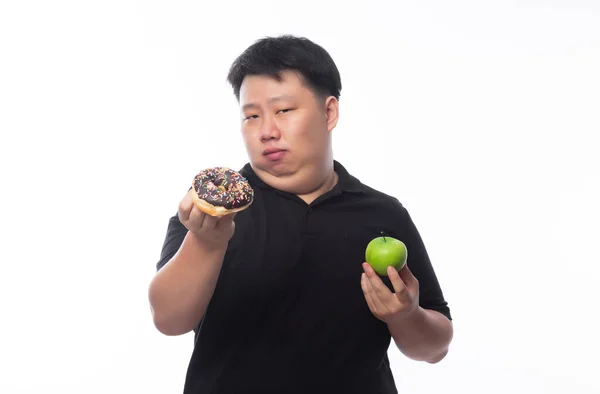 Jovem Engraçado Gordo Asiático Homem Escolher Entre Donuts Chocolate Maçã — Fotografia de Stock