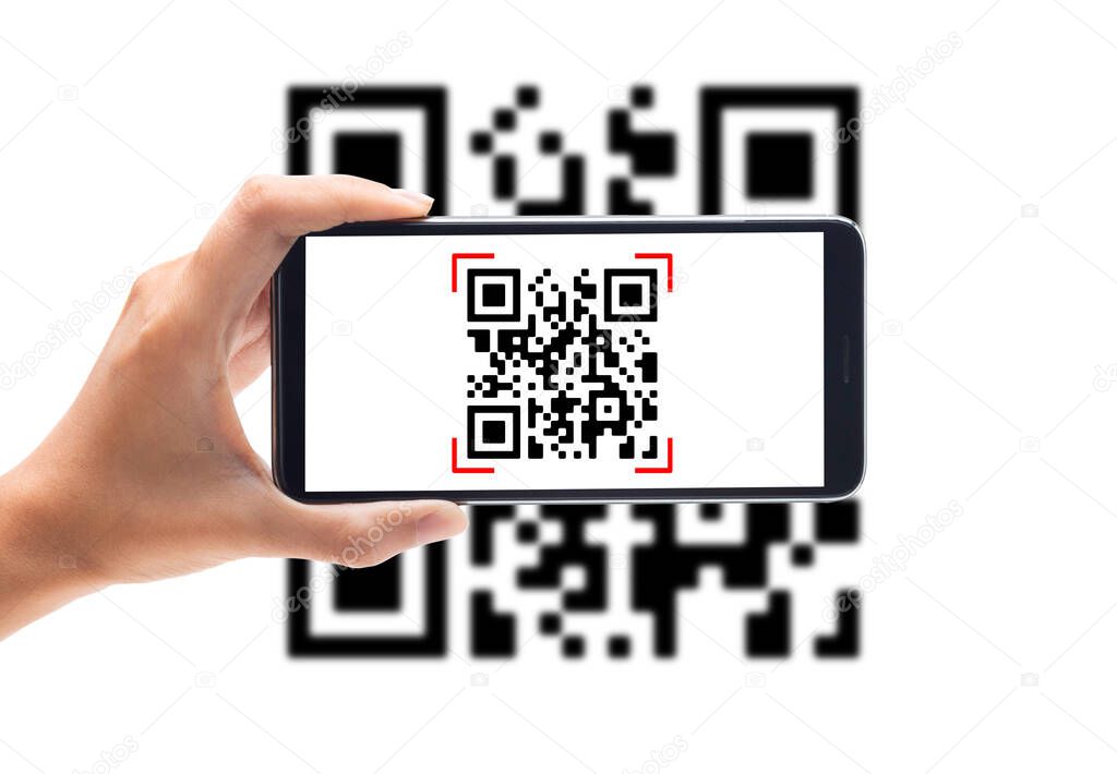 Hand using mobile smart phone scan Qr code on white background. Cashless technology and digital money concept.