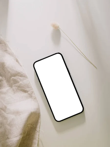 Smartphone mockup, Phone with blank screen template. Flat lay, Minimalist styled.