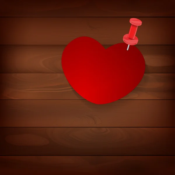 Pinned heart on wood — Stock Vector
