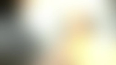 Genel kullanım için bulanık arkaplanı hareket ettiren soyut sarı ve gri renkler. Renkler konuma göre değişir, pürüzsüz renk geçişleri oluşturur. Renk neon gradyanı. 4k