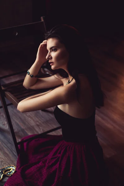 Sensual woman lying on chair — Stock Photo, Image