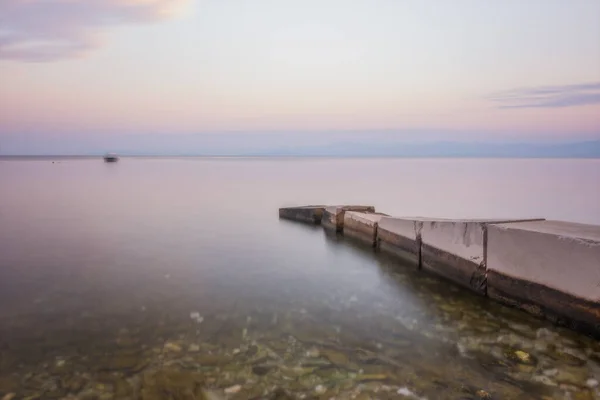 Stone Pier Boat Long Exposure Low Saturation Croatia Brac Island — Stock Photo, Image