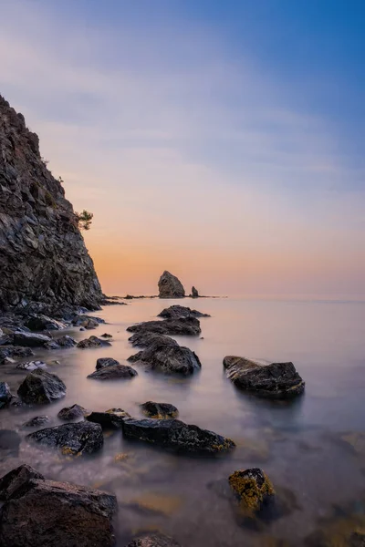 Picturesque Mediterranean seascape in Turkey. Colorful sunrise in a small bay near the Tekirova village, District of Kemer, Antalya Province. Long exposure photo. — Stock Photo, Image