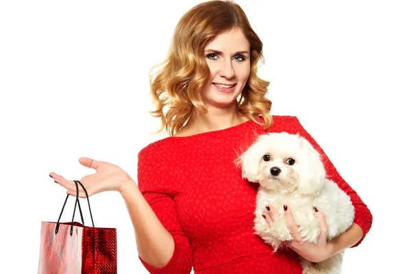 Beautiful young woman and a sweet little white dog. Shopping — Stock Photo, Image