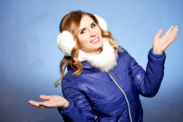 Winter woman in warm clothes and with ear muff — Stock Photo, Image