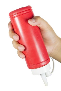 Beyaz zemin üzerine kırmızı biber ve domates ketçap şişesi