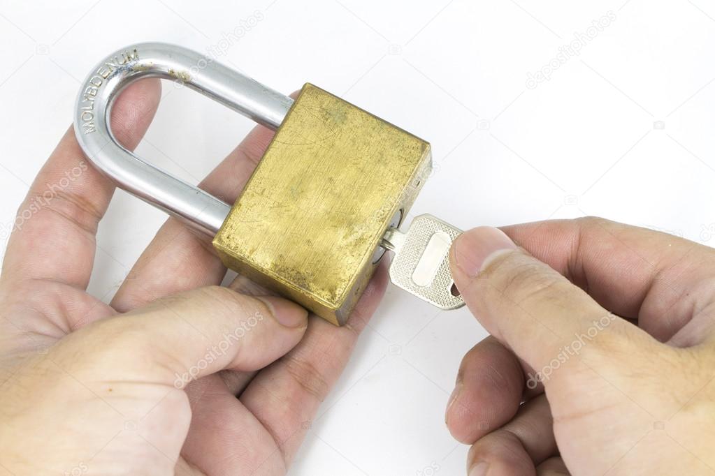 The lock and key on white background