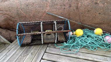 fishing traps ready for use in a small port in southwest Sweden on the Atlantic Ocean