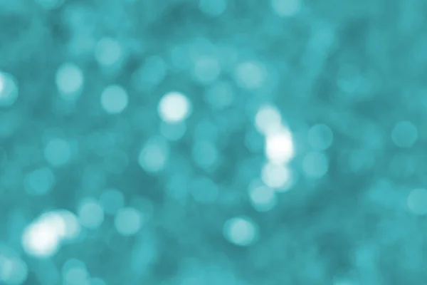 abstract turquoise background with blurred bokeh