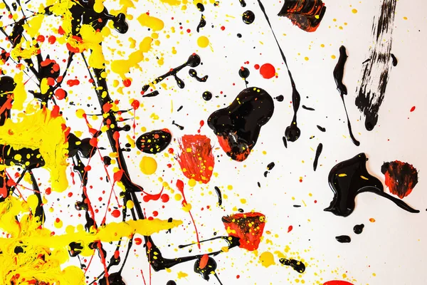 Abstract expression colorful splash background. bright Watercolor background illustration. dripping technique. black and white and red and yellow. horizontal orientation.