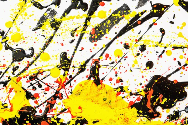 Abstract expression colorful splash background. bright Watercolor background illustration. dripping technique. black and white and red and yellow. horizontal orientation.