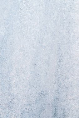 Tavan penceresi desenli kar taneleri ve buzlu arka plan. dikey