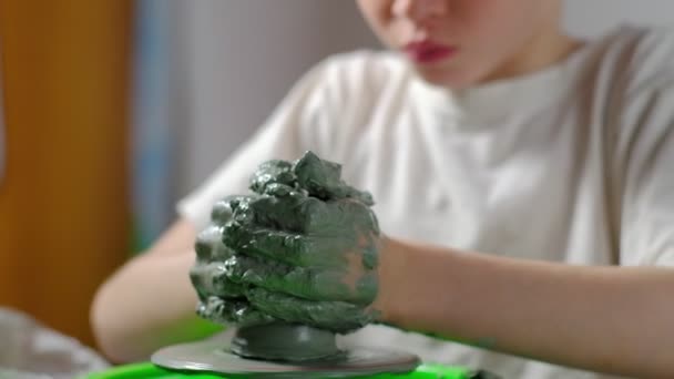 Seven Year Old Boy Soiled Clay Concentrating Making Clay Product — Stock Video