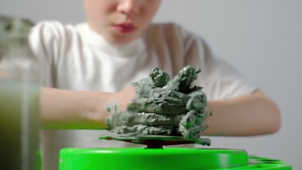 Seven Year Old Boy Soiled Clay Concentrating Making Clay Product — Stock Video