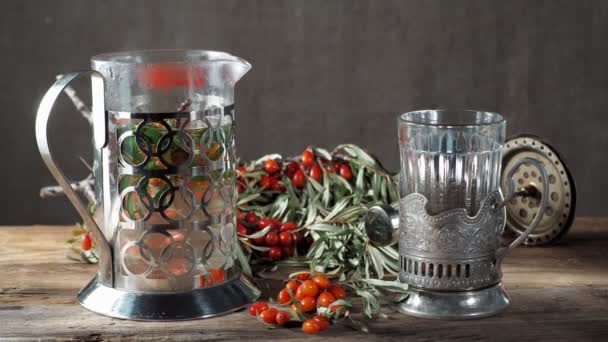 Teapot Press Glass Tea Sea Buckthorn Sea Buckthorn Bunches Background — Stock Video