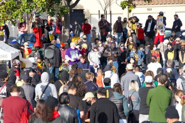 Oakland, CA - Feb 13, 2021: Unidentified participants at the Love Our People Heal Our Communities vigil in China Town. Organized to be united to condemn harm against Asian elders, women and youth.