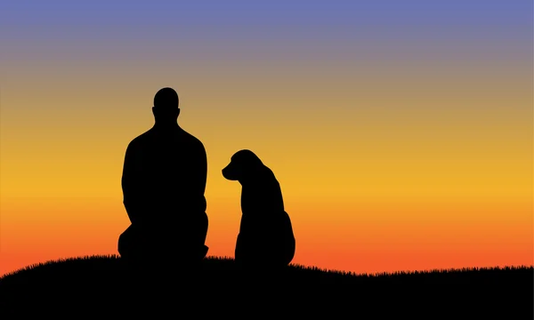 Silhouette eines Mannes mit Hund — Stockvektor