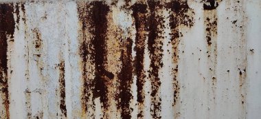Paslı demir dokusu, eski metalik bir yüzeyde çatlak boya çatlak ve pul pul pul boyanmış metal levha, aşınma, çürümüş metal zemin, çürümüş çelik, çürümüş yüzey.