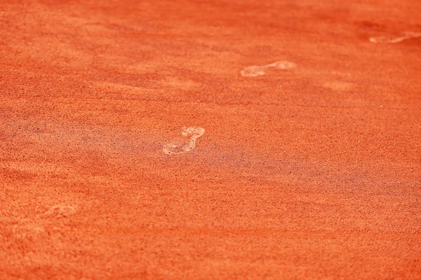 Huellas en pista de tenis de arcilla —  Fotos de Stock