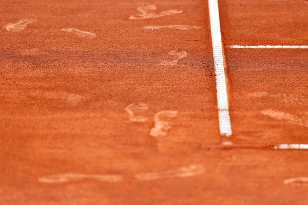 Huellas en pista de tenis de arcilla —  Fotos de Stock