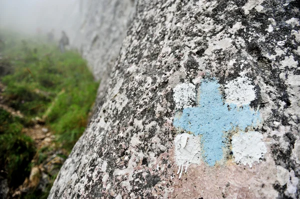 Blue cross hiking and trekking symbol — Stock Photo, Image