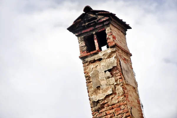 Very old brick smoking chimney — Stock Photo, Image