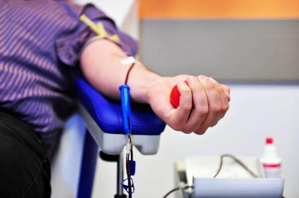 Blood donor hand — Stockfoto