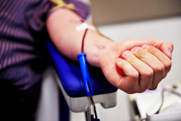 Blood donor hand — Stockfoto