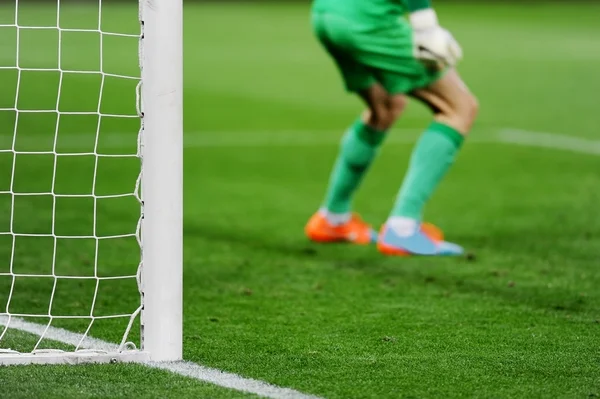 Soccer goal with goalkeeper in background — Stock Photo, Image