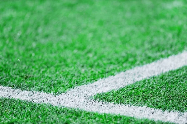 Fresh paint stripes on soccer field — Stock Photo, Image