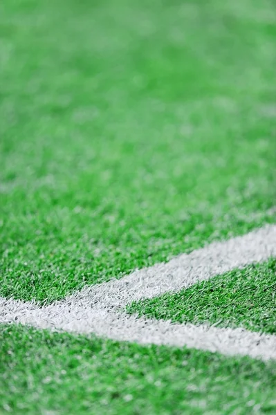 Fresh paint stripes on soccer field — Stock Photo, Image