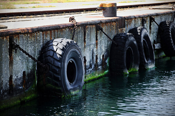 Tyre bumpers in a commercial dock